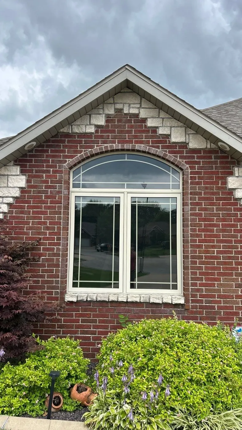 Before: the arched feature window was ready for an exterior refresh.
